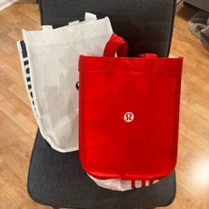 Two lululemon small tote bags new